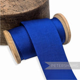 Petershams Millinery Supplies 40mm wide royal blue vintage grosgrain ribbon on a wooden spool for millinery trim.