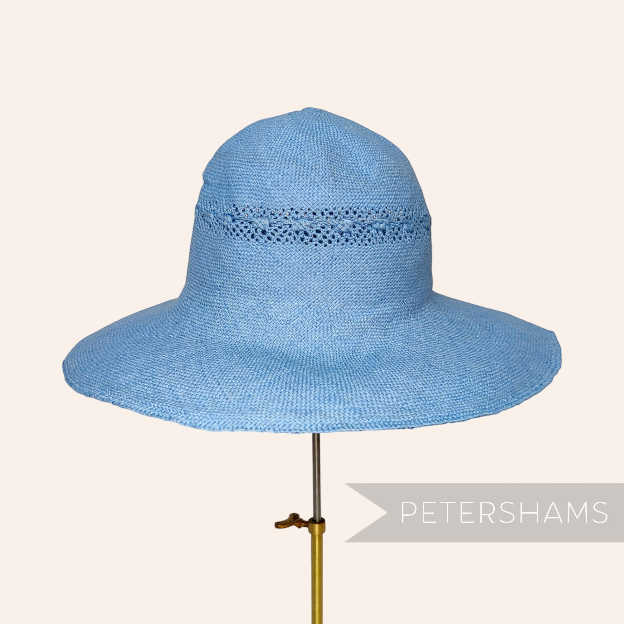 Petershams Millinery Supplies cornflower blue paper capeline hat body with decorative open weave side crown vent