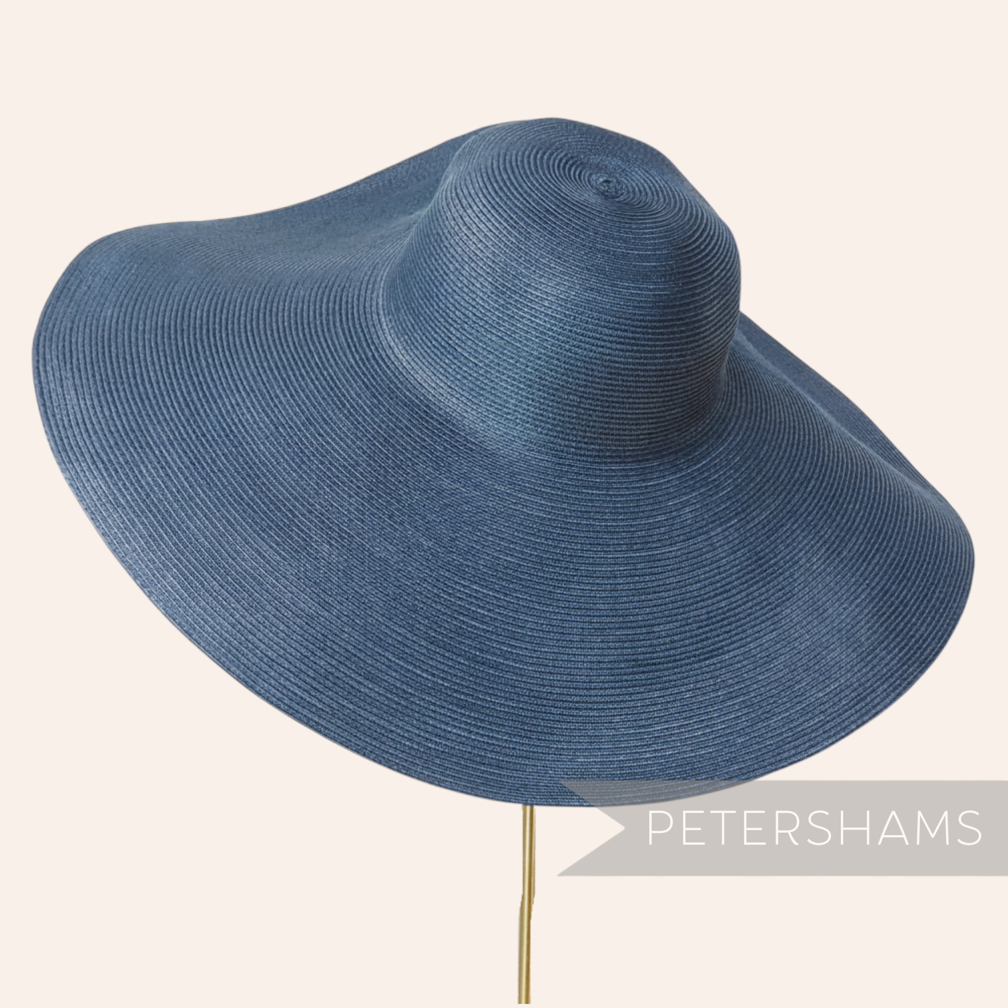 Petershams Millinery Supplies XL blue polybraid capeline hat body with a wide, undulating brim and polybraid finish