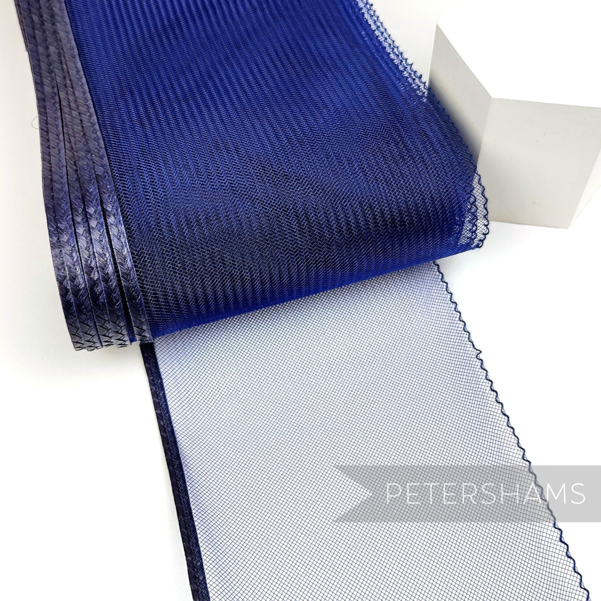 Petershams Millinery Supplies 15cm wide royal blue crinoline ribbon with a shiny polybraid edge for hat making