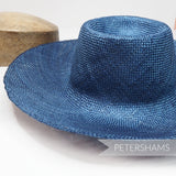 Petershams Millinery Supplies  navy blue ramie straw capeline hat body with a 1x1 checker weave and smooth ironed finish.