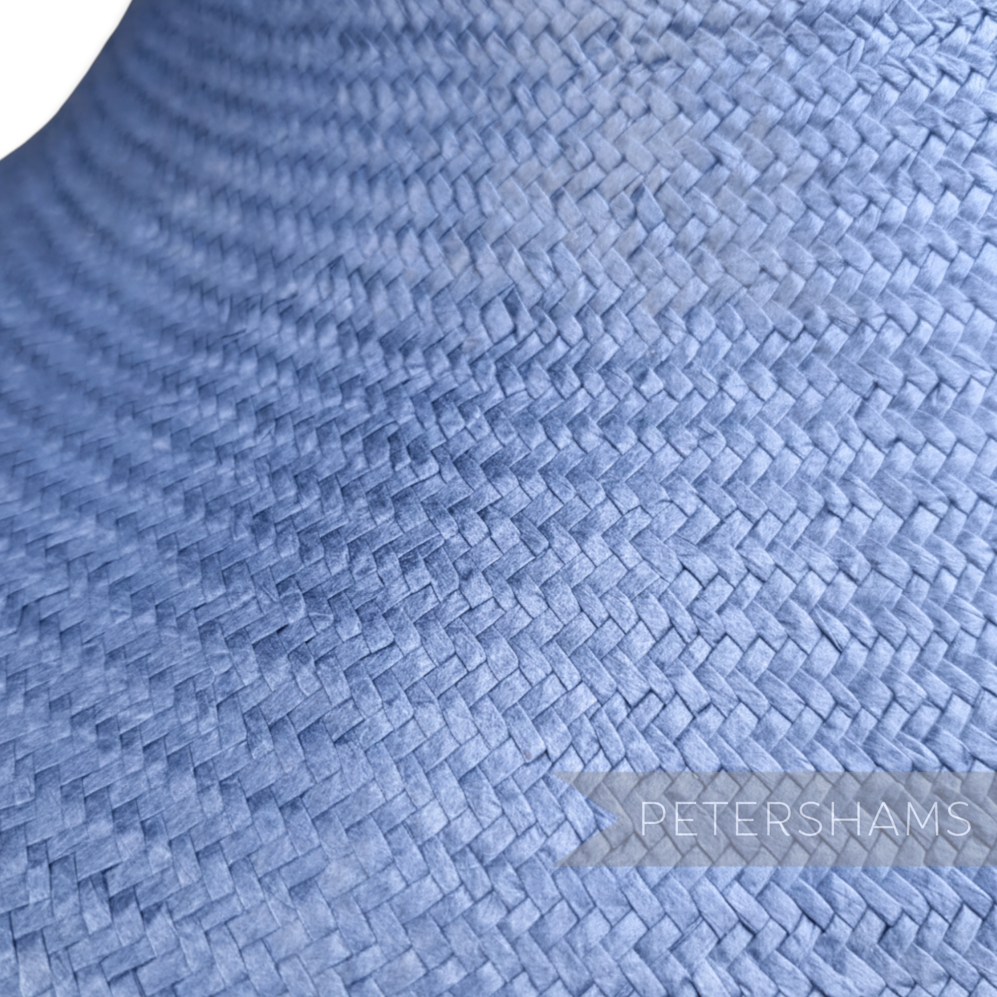 Petershams Millinery Supplies blue Toyo paper capeline hat body featuring a detailed herringbone weave pattern