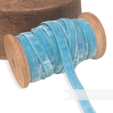 Petershams Millinery Supplies 10mm vintage light blue rayon velvet ribbon on a wooden spool