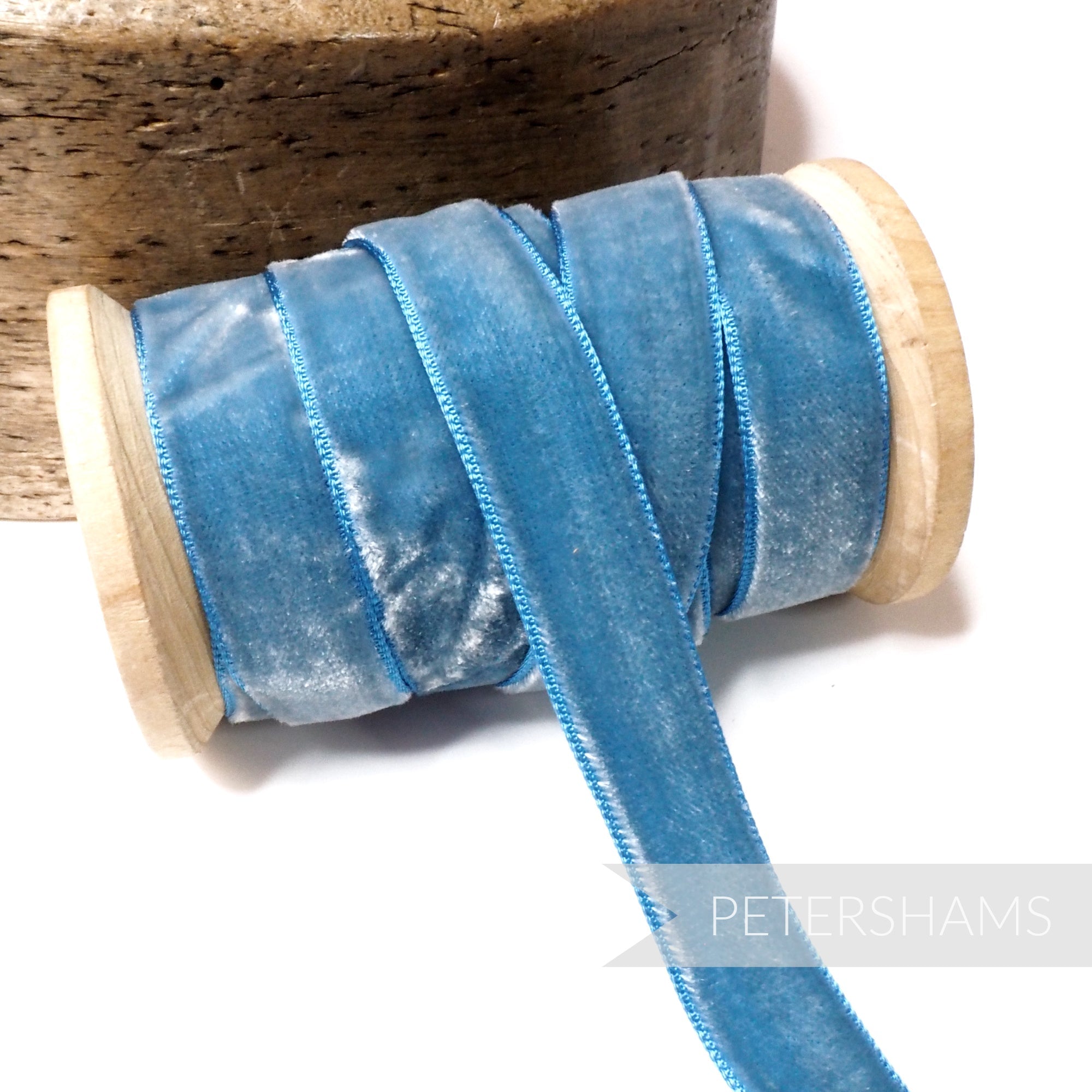 Petershams Millinery Supplies 16mm vintage blue rayon velvet ribbon on a wooden spool