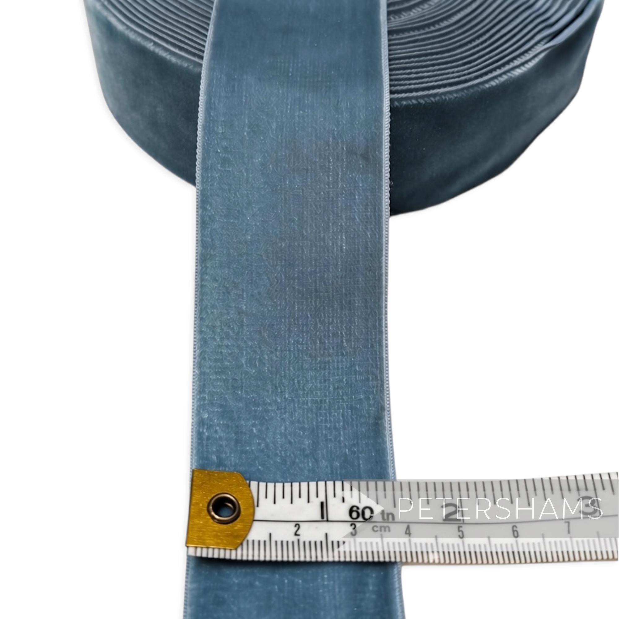 Petershams Millinery Supplies 38mm wide vintage blue velvet ribbon being measured with a tape measure