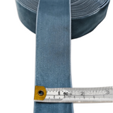Petershams Millinery Supplies 38mm wide vintage blue velvet ribbon being measured with a tape measure
