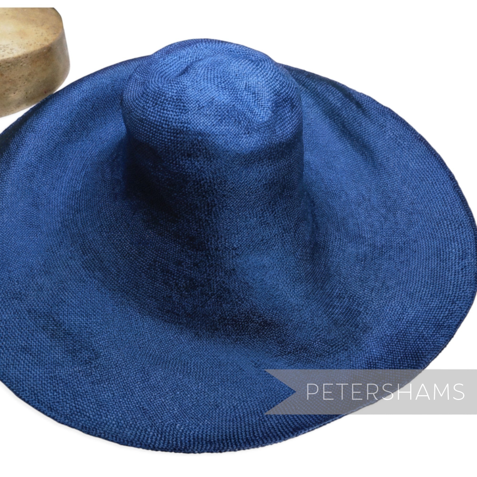 Petershams Millinery Supplies mega XL blue visca capeline hat body with a 1x1 checkerboard weave and wide floppy brim.