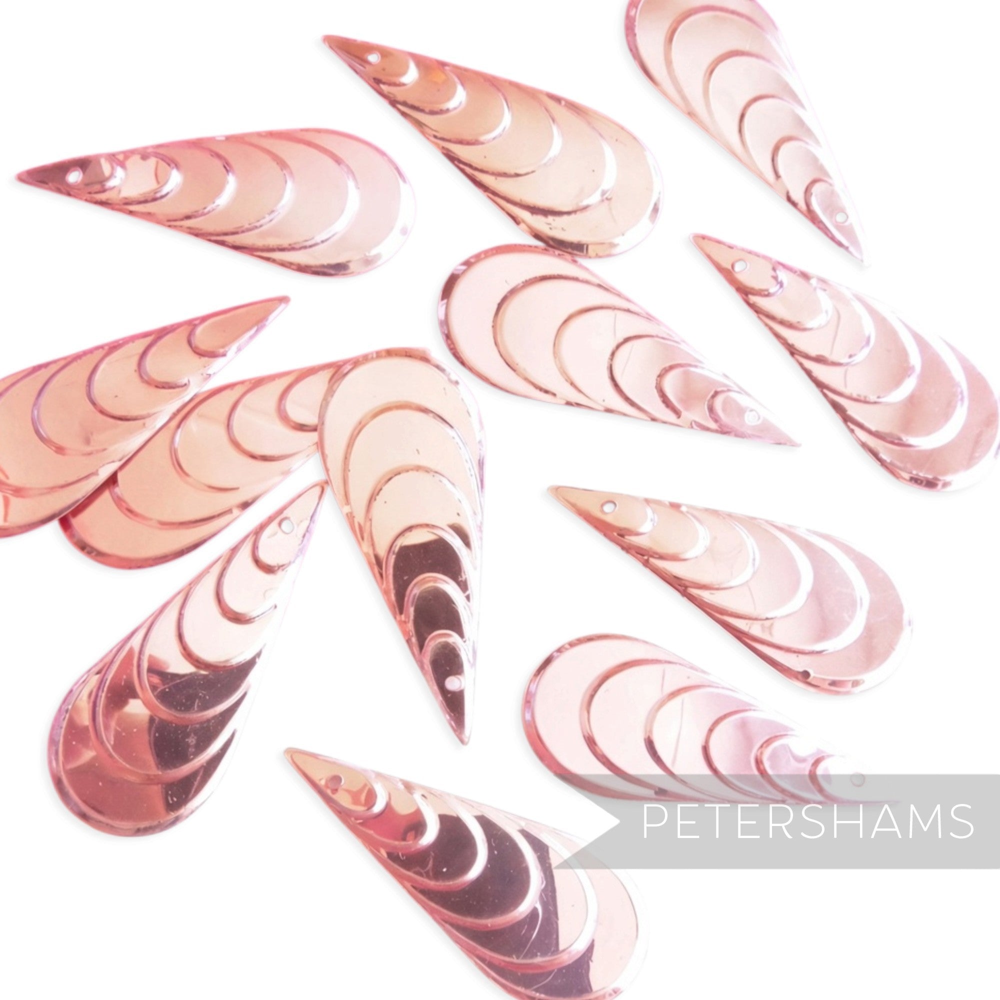Petershams Millinery Supplies vintage metallic blush pink tiered teardrop sequins with a single top sew hole.