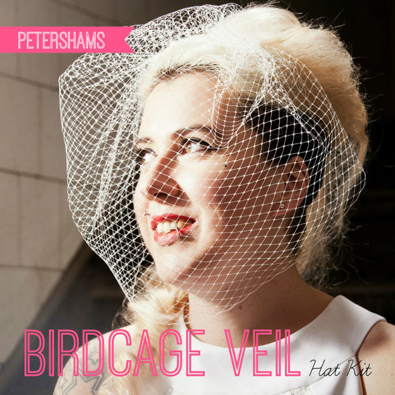 Petershams Millinery Supplies DIY birdcage veil kit worn by a woman with blonde hair and a white dress