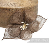 Petershams Millinery Supplies brown sinamay hibiscus flower hat mount with leaves and stamens.