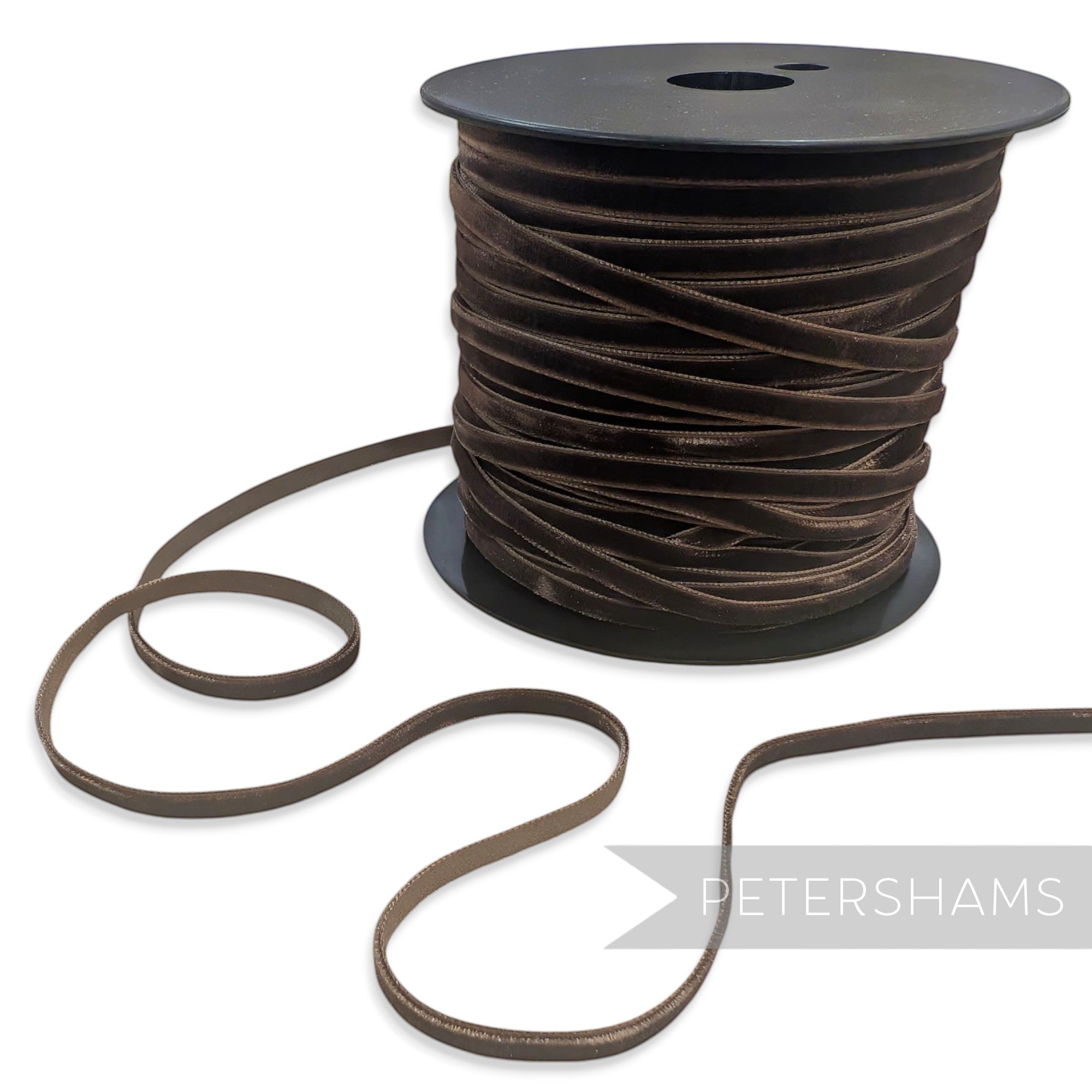 Petershams Millinery Supplies 7mm chocolate brown French velvet ribbon on a black spool for millinery and craft projects.