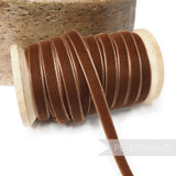 Petershams Millinery Supplies 7mm brown vintage velvet ribbon wrapped on a wooden spool for millinery and craft projects
