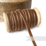 Petershams Millinery Supplies 7mm brown vintage rayon velvet ribbon on a wooden spool