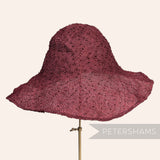 Petershams Millinery Supplies knotted ramie straw capeline hat body in burgundy with intricate textured stitch.