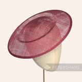 Petershams Millinery Supplies large round burgundy sinamay fascinator hat base on a millinery head form