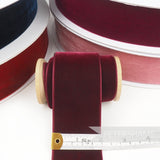 Petershams Millinery Supplies 50mm wide deep burgundy French velvet ribbon on a wooden spool