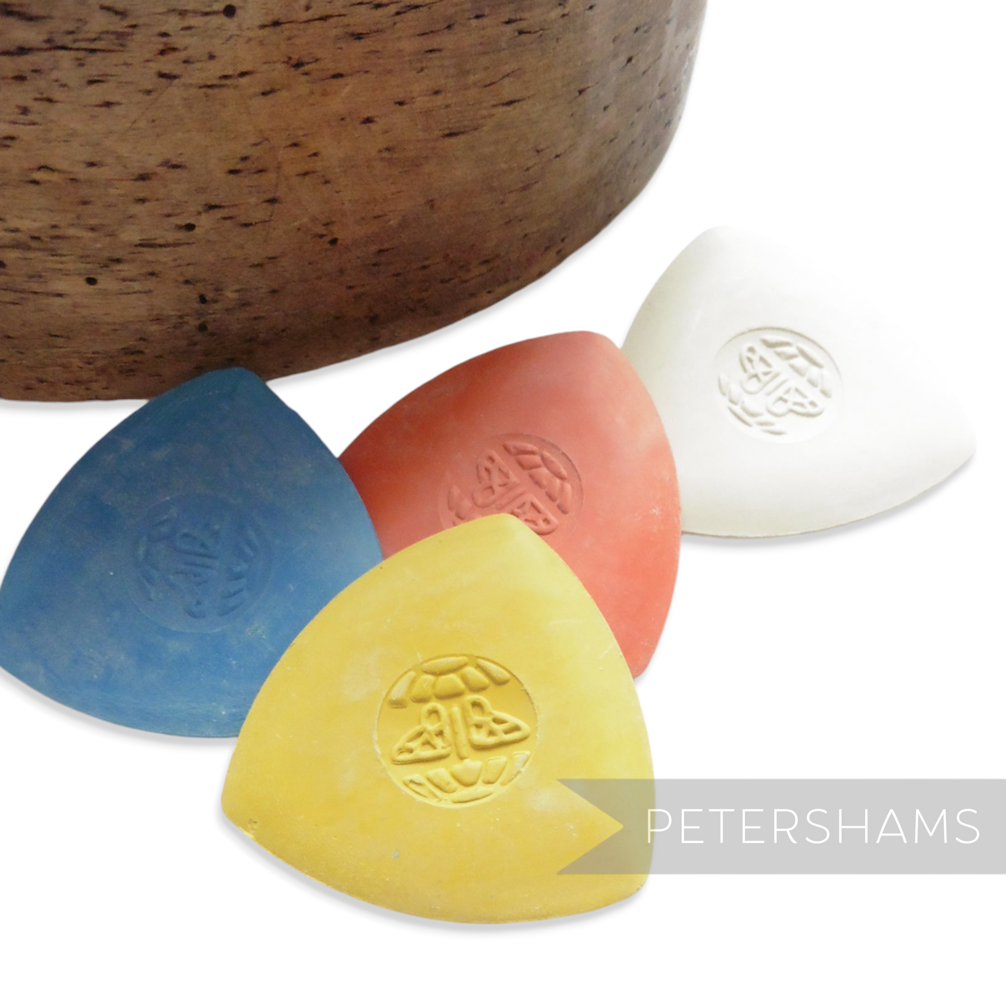 Petershams Millinery Supplies Butterfly brand triangular tailors chalk in yellow, red, blue, and white colors.