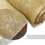 Petershams Millinery Supplies yellow cheetah print sinamay fabric made from natural abaca, ideal for hat making.