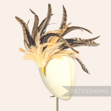 Petershams Millinery Supplies extra large chinchilla pattern coque and hackle feather hat mount on a millinery block