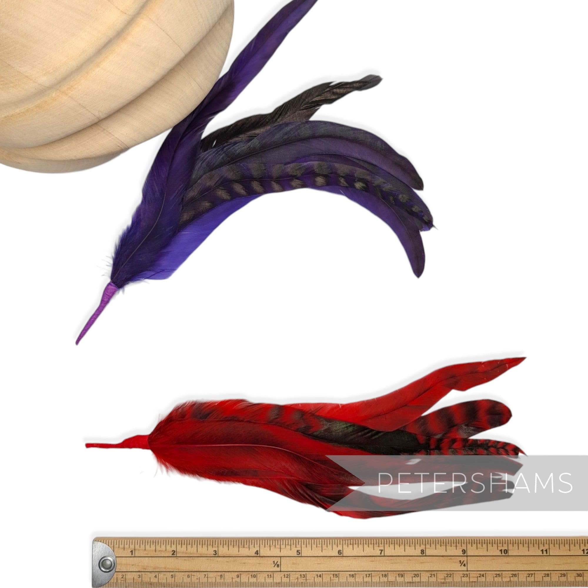 Petershams Millinery Supplies chinchilla full coque feather hat mounts in purple and red with striped patterns