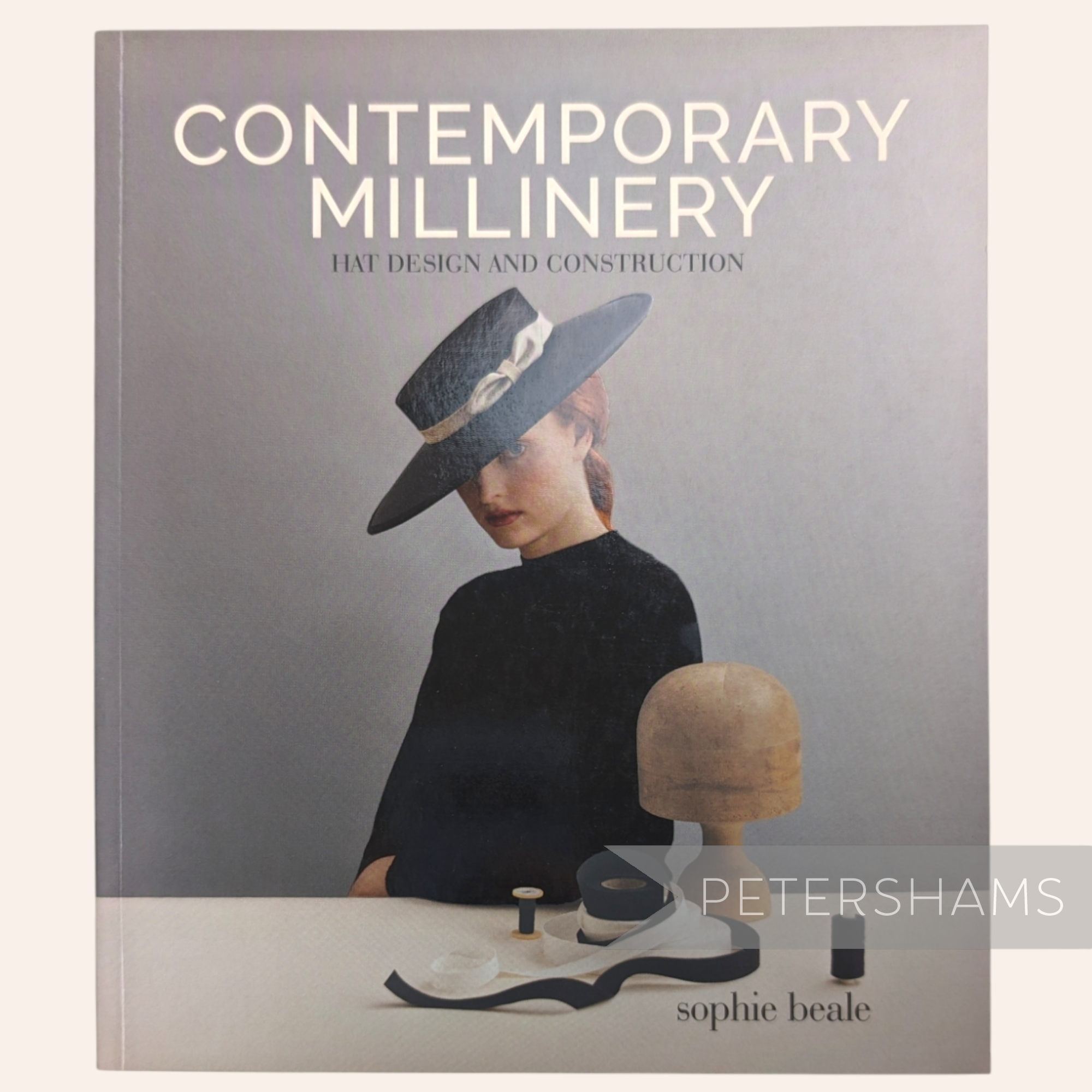 Petershams Millinery Supplies Contemporary Millinery book cover featuring a model in a black hat and millinery tools