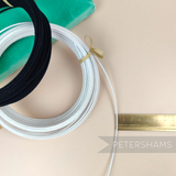 Petershams Millinery Supplies 1.2mm French cotton covered millinery wire in black and white coils