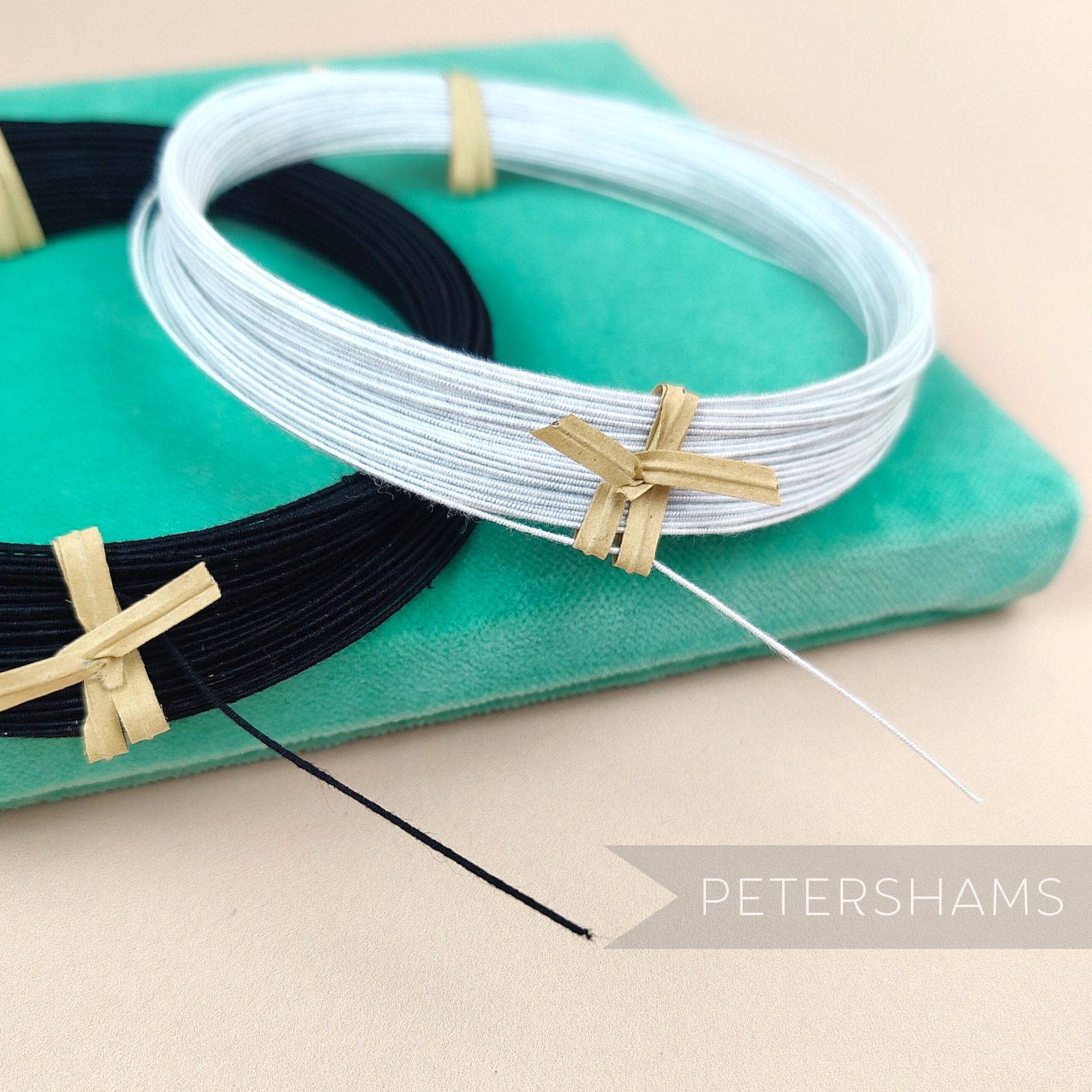 Petershams Millinery Supplies 0.4mm French cotton covered steel millinery wire in black and white coils