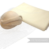 Petershams Millinery Supplies 18 inch wide cream diamond pattern birdcage veiling draped over a wooden hat block