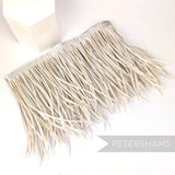 Petershams Millinery Supplies extra long light beige goose biot feather fringe on a stitched satin ribbon binding