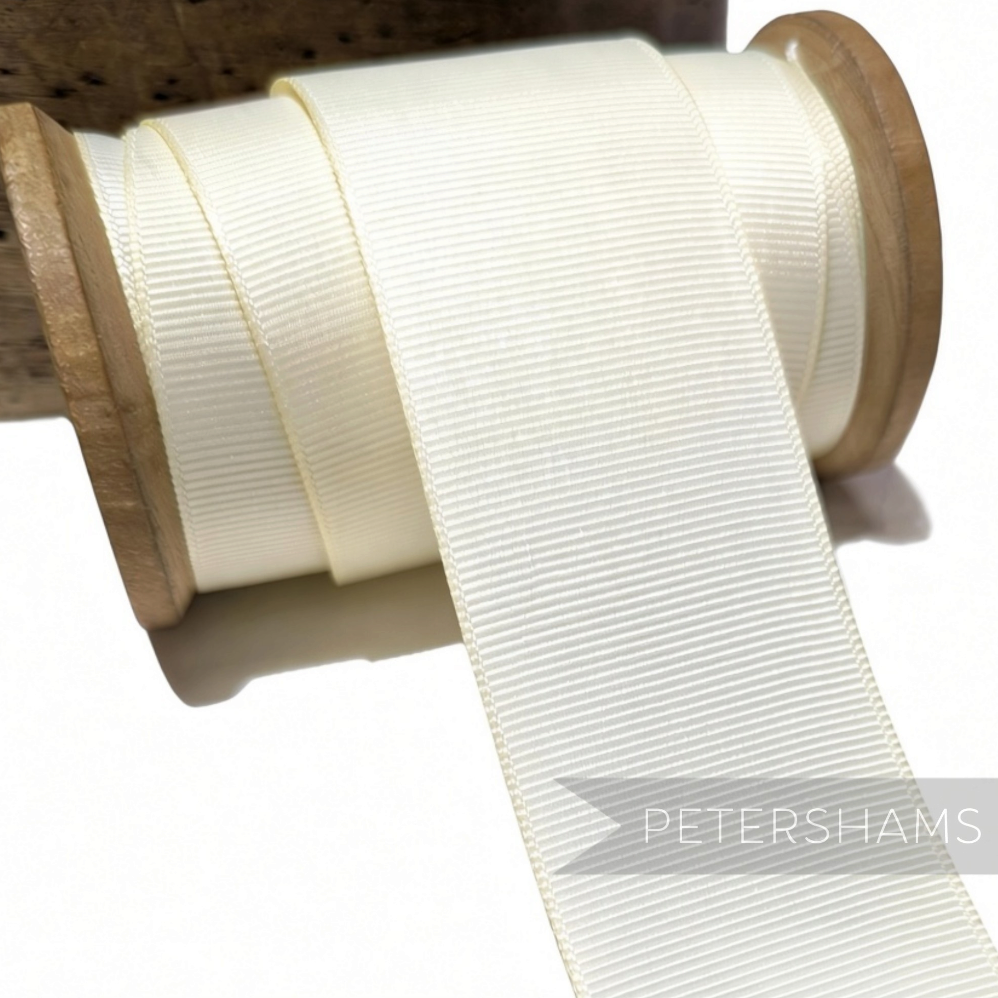 Petershams Millinery Supplies 38mm cream polyester grosgrain ribbon on a wooden spool for gift wrapping and crafts