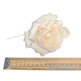 Petershams Millinery Supplies cream silk Kullie hat flower with curled petals and leaves on a wire stem