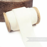 Petershams Millinery Supplies 36mm ivory French velvet ribbon on a wooden spool for millinery and craft projects