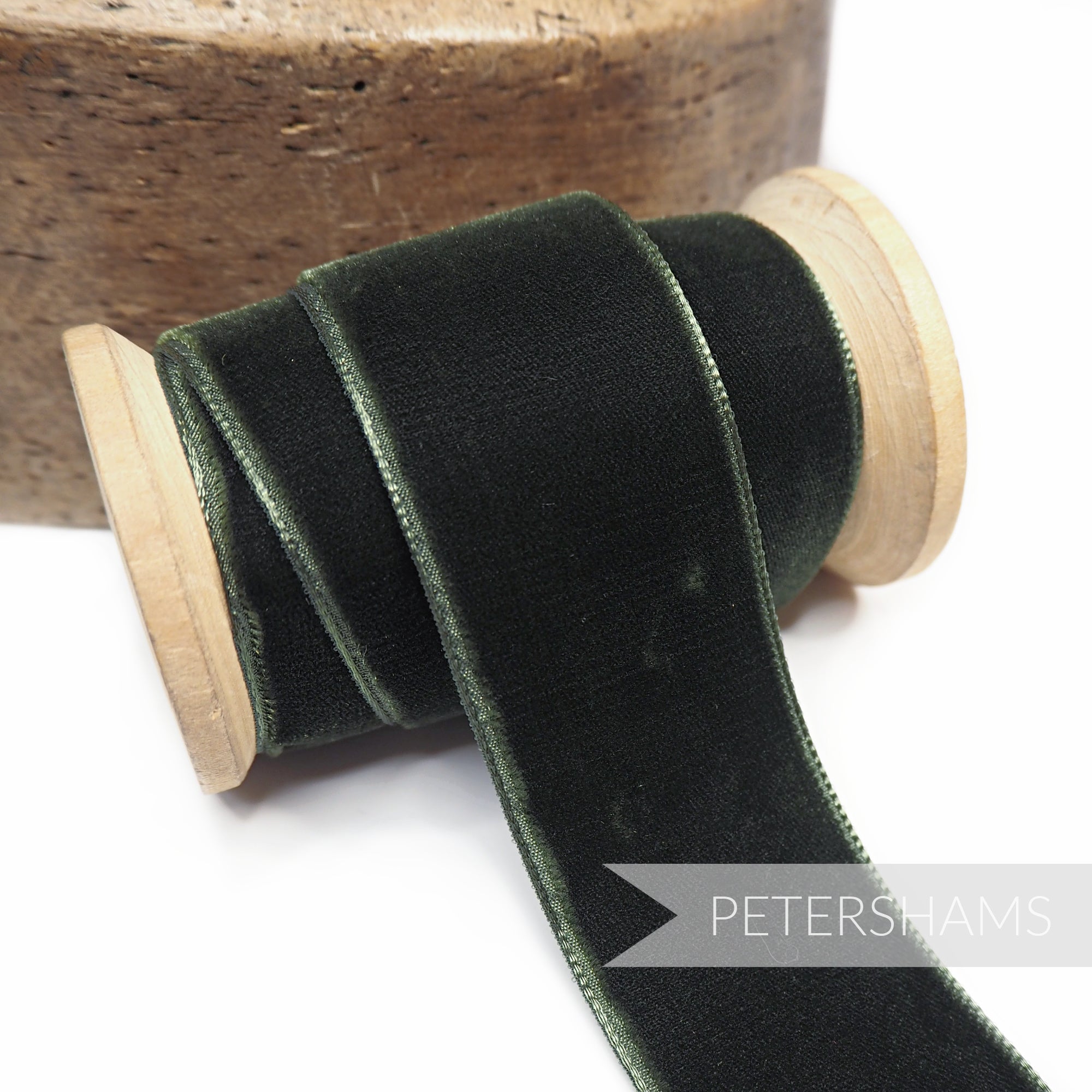 Petershams Millinery Supplies 36mm deep moss green French velvet ribbon on a wooden spool for craft and millinery projects