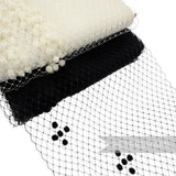 Petershams Millinery Supplies vintage replica veiling with chenille dotted diamond pattern in black and cream