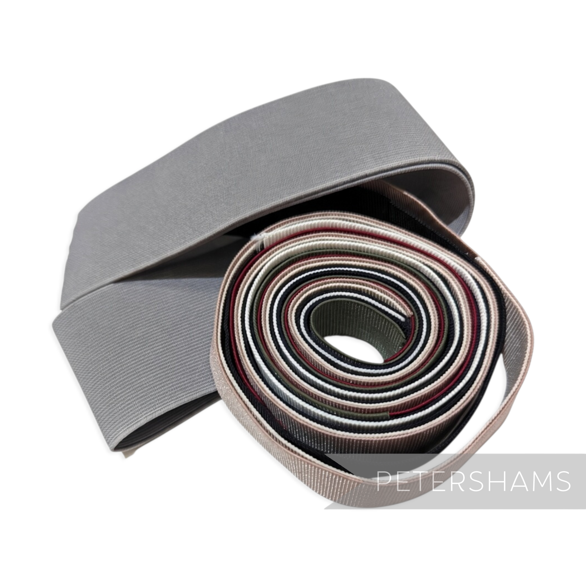 Petershams Millinery Supplies lucky dip pack of assorted wide elastic ribbon remnants in various colours and textures.