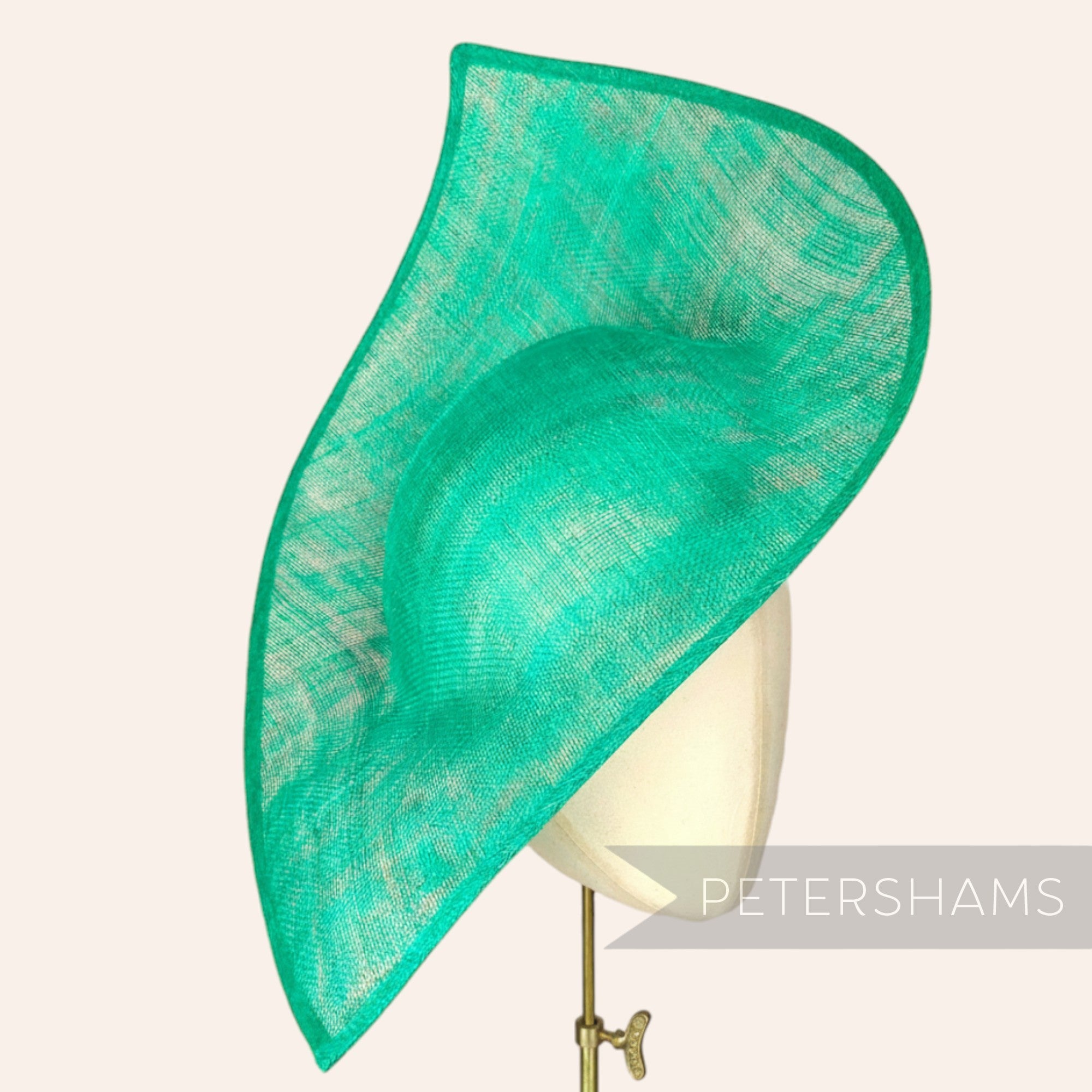 Petershams Millinery Supplies Jackie emerald green sinamay fascinator hat base with double pointed curvy design