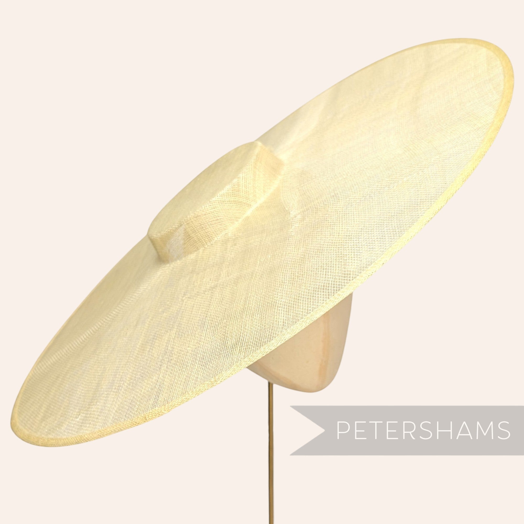 Petershams Millinery Supplies extreme cartwheel sinamay fascinator hat base in butter yellow for millinery projects.