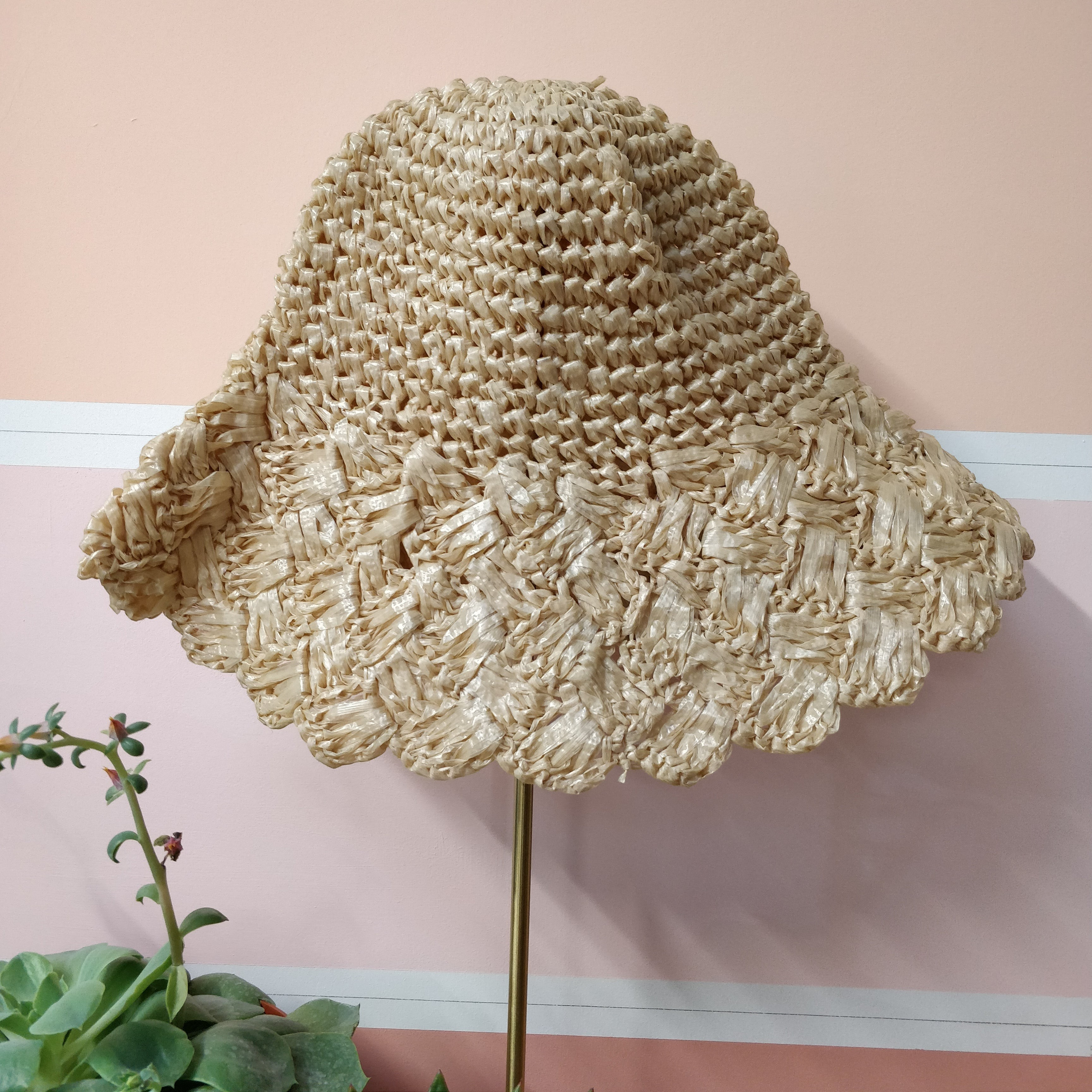 Petershams Millinery Supplies faux straw capeline hat body with a decorative scalloped edge in a natural beige tone.