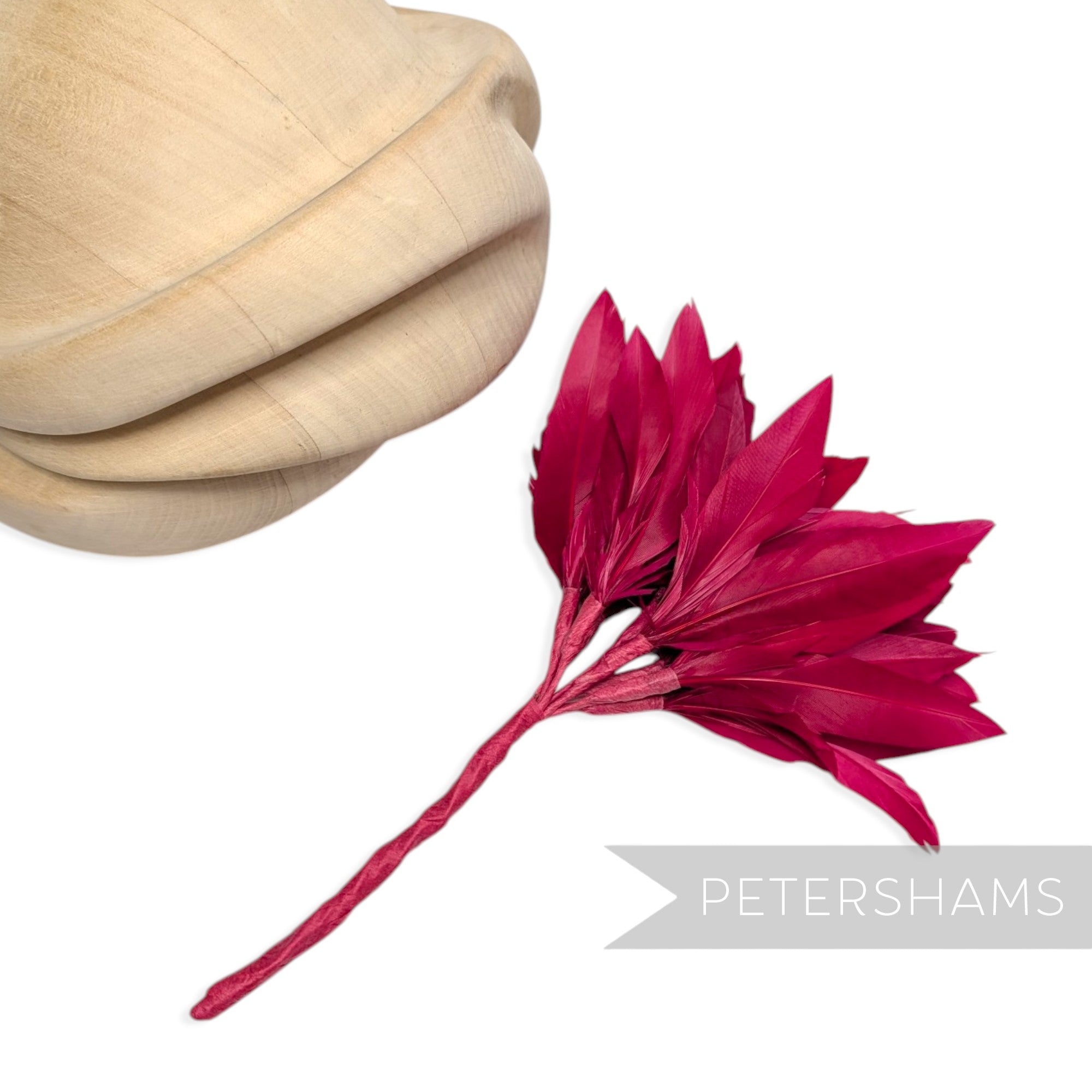 Petershams Millinery Supplies Kay large fuchsia goose feather pom flower mount with wired stems for hat making.