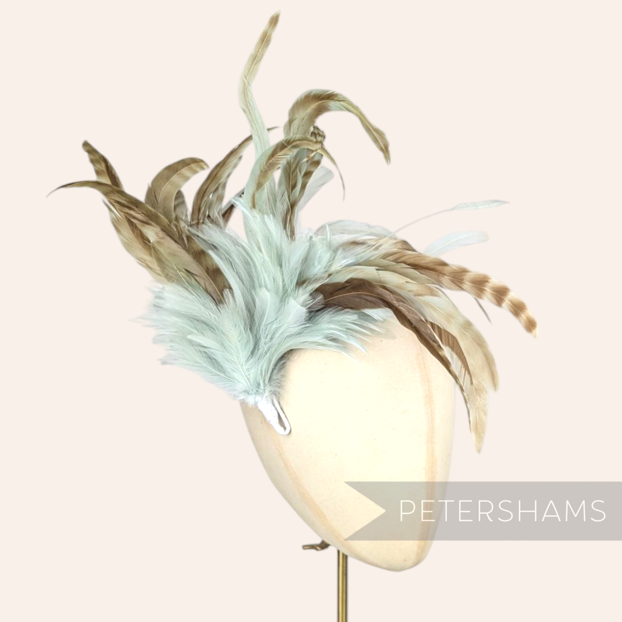 Petershams Millinery Supplies extra large feather hat mount with chinchilla pattern, stripped coque, and hackle feathers