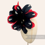 Petershams Millinery Supplies large feather hat mount featuring black and red goose nagorie and french partridge feathers
