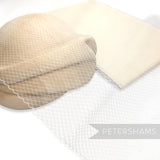 Petershams Millinery Supplies fine weave veiling with 5mm diamonds and scalloped edge draped over a wooden hat block