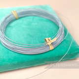 Petershams Millinery Supplies 0.4mm French rayon covered millinery wire in silver, coiled for craft and flower making.