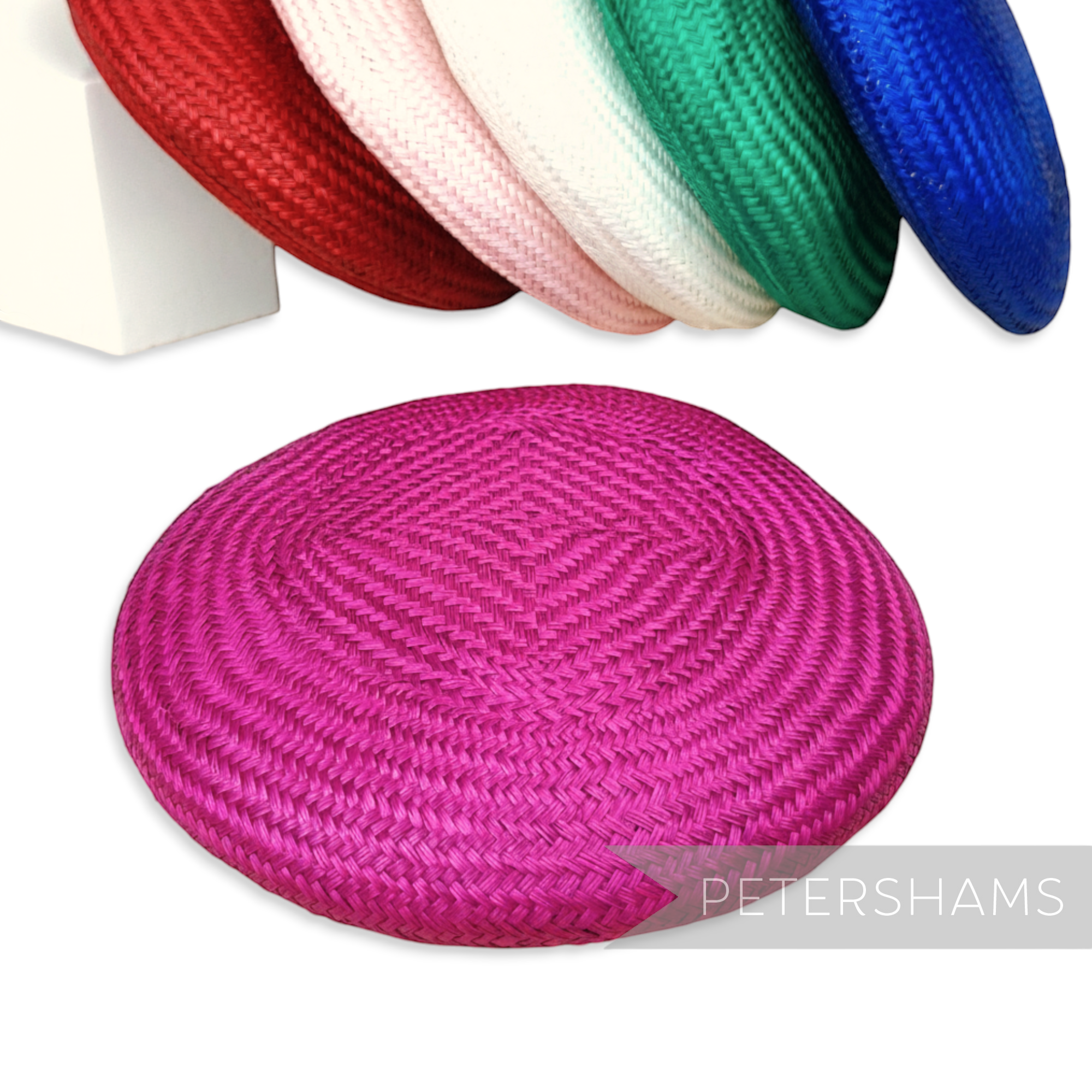 Petershams Millinery Supplies fuchsia pink round buntal straw button fascinator hat base with a tight woven texture.