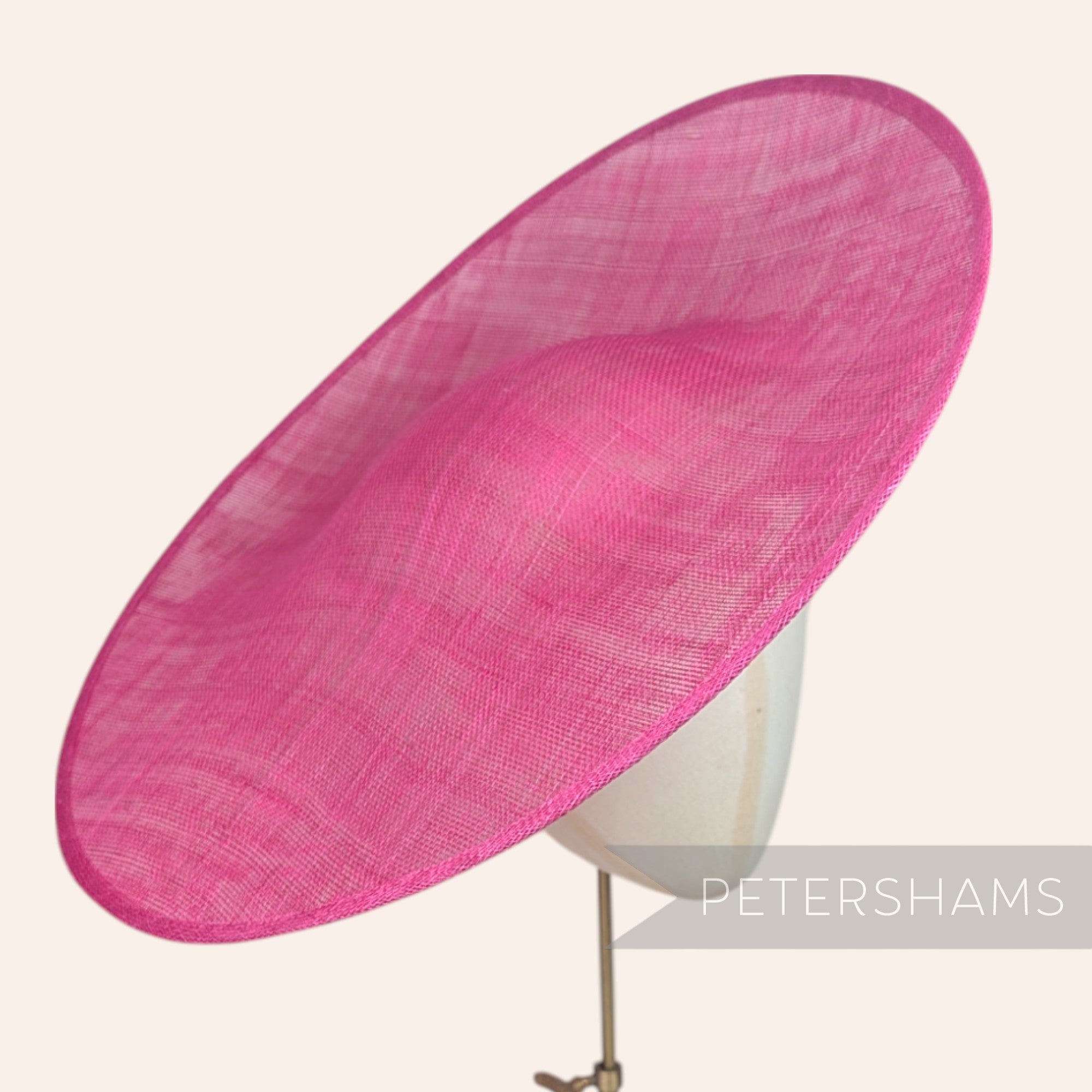Petershams Millinery Supplies Catherine XL fuchsia pink sloped sinamay fascinator hat base for millinery projects.