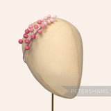 Petershams Millinery Supplies Giselle mini silk rosebud hat mount in ombre pink on a millinery display head