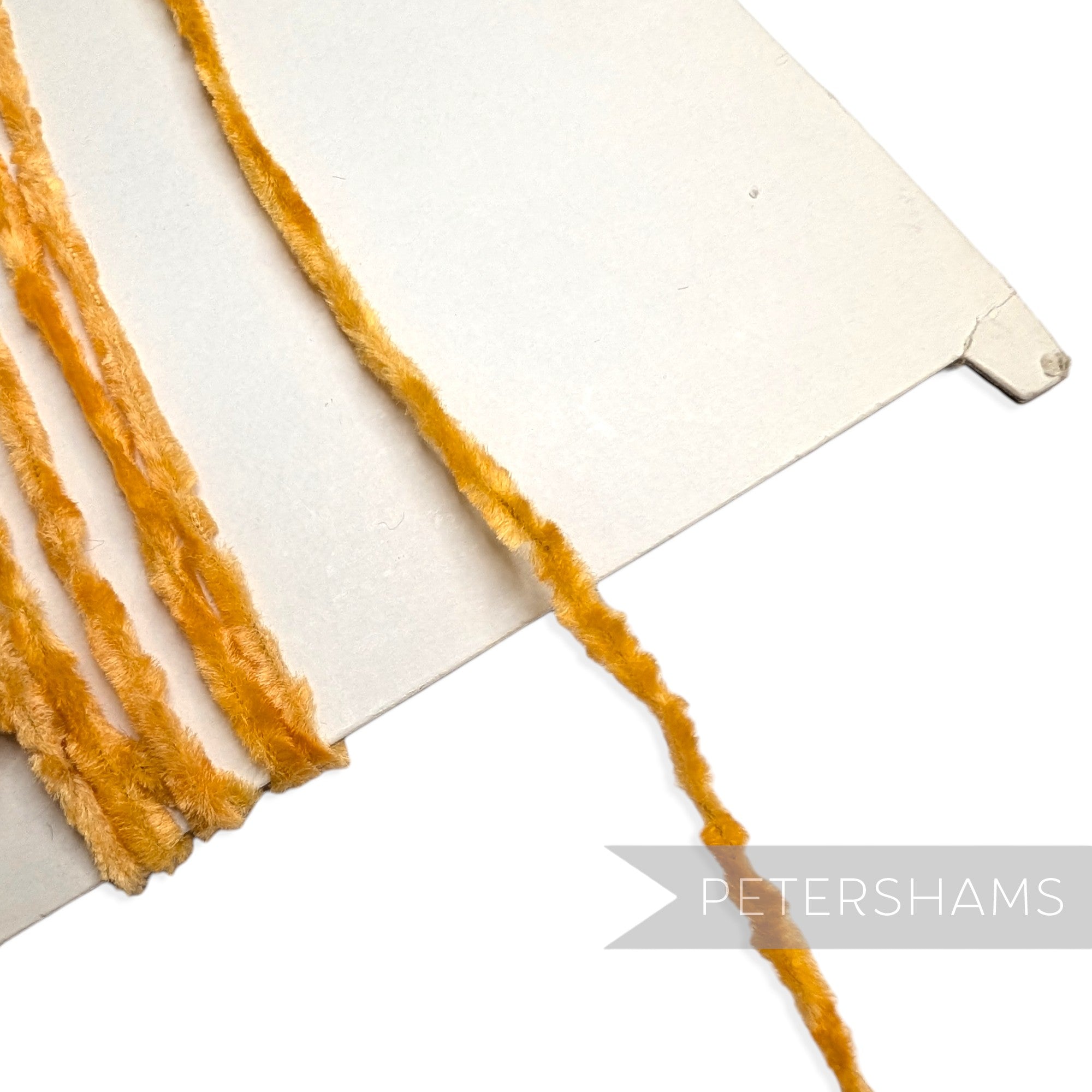Petershams Millinery Supplies vintage gold chenille wire for millinery veiling dots on a cardboard spool
