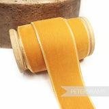 Petershams Millinery Supplies 36mm wide gold French velvet ribbon on a wooden spool
