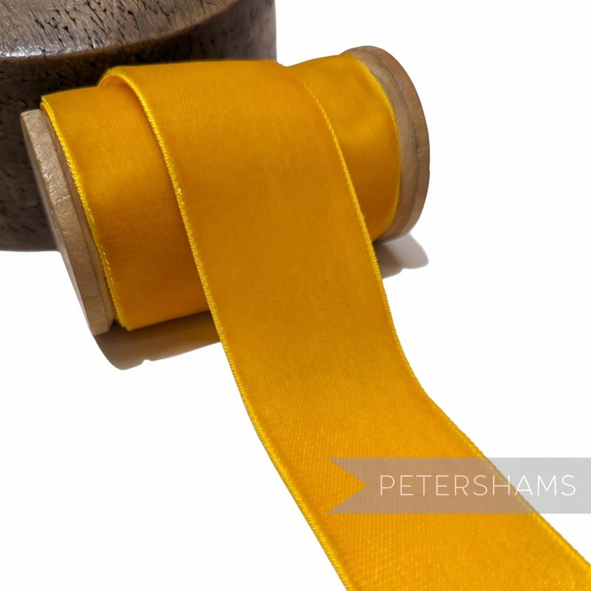 Petershams Millinery Supplies 38mm golden yellow vintage velvet ribbon on a wooden spool