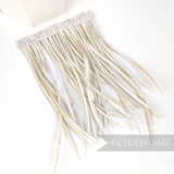 Petershams Millinery Supplies extra long light beige goose biot feather fringe on a stitched satin ribbon binding